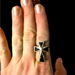 Black and silver cross ring size nine big and brand new bought from stage